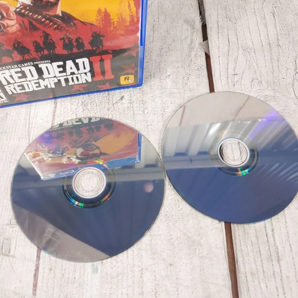 Red Dead Redemption II Sony PS4 Video Game 2 Disc Set Action Western TESTED